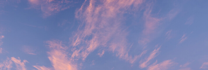 The morning sky where the sun shines against the clouds