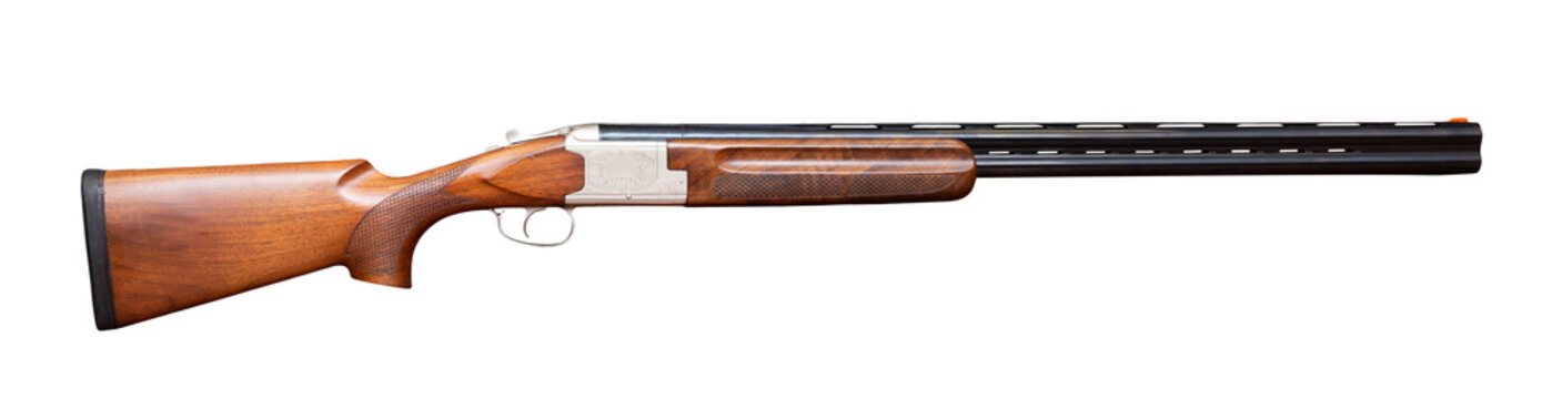 Double-barrelled smoothbore hunting shotgun with wooden gunstock isolated on white background