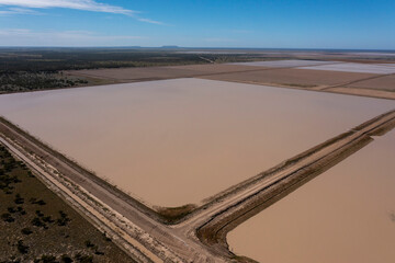 Huge water filled dams in the far outback of New South Wales ready to feed cotton crops.