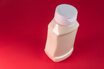 Mayonnaise can on the red background