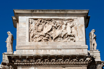 4th century Arch of Constantine, (Arco di Costantino) next to Colosseum, details of the attic, Rome, Italy