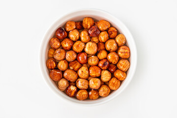 Process of soaking various nuts: hazelnuts in water to activate. Home Cooking: making plant based organic veggie Milk, lactose free.