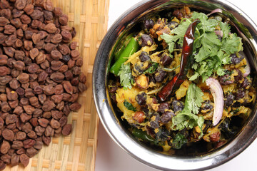 Bengali style black chickpeas chana sola lentil dal peas bhuna recipe onion garlic dry chili bay leaf cinnamon fumaric power cumin seeds salt