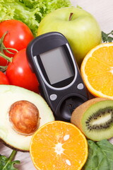 Glucose meter with fresh fruits and vegetables. Healthy nutrition and checking sugar level concept