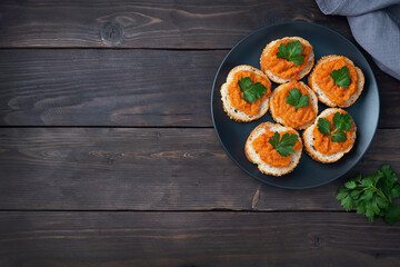Sandwiches with bread zucchini caviar tomatoes onions. Homemade vegetarian food. Canned stewed vegetable. wooden background top view, copy space