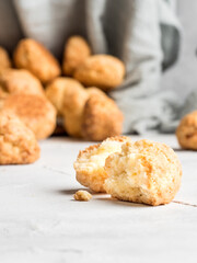Shortbread cookies on a light background with spring flowers. Copy space.