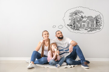 Young family dreaming about moving into new house