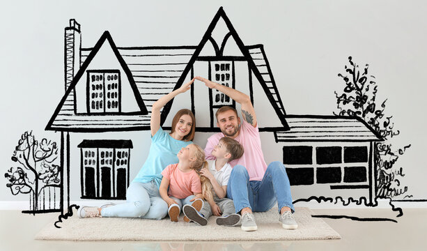 Young Family Dreaming About Moving Into New House