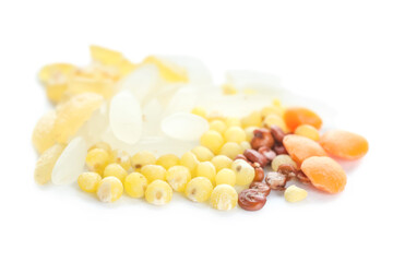 Heap of different cereals and legumes on white background