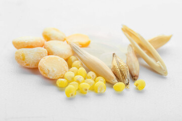 Heap of different cereals and legumes on white background