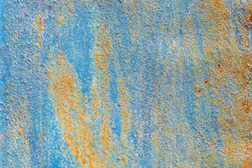 Old metal rusted plate with peeling blue paint. Texture background.