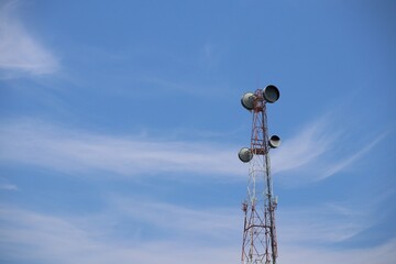 Telecommunication tower with a blue background Sky antenna Radio and satellite Communication technology. Telecommunications industry Mobile network or telecommunications 4g