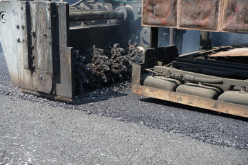 Road maintenance work With heavy machinery by HOT MIX IN - PLACE RECYCLING method