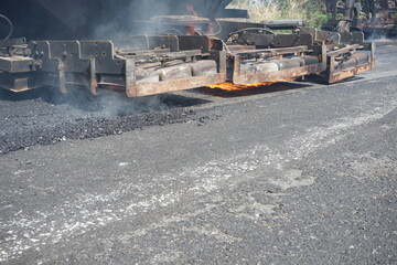 Road maintenance work With heavy machinery by HOT MIX IN - PLACE RECYCLING method