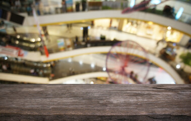 Empty wooden table in front of abstract blurred background of coffee shop . can be used for display or montage your products.Mock up for display of product