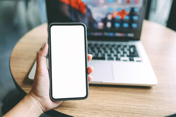 Women's hands holding cell telephone blank copy space screen. smartphone with blank white screen isolated on white background . smart phone with technology concept