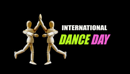 International Dance Day with couple dancing wooden model on black background,
