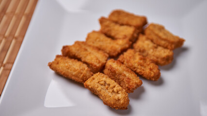 chicken nugget tenders served on plate