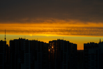 Sunset orange sky over the big city