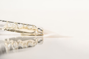 Cosmetic product in a pipette with bubbles.