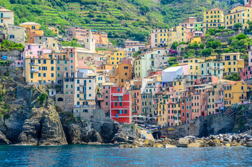 Riomaggiore in Cinque Terre, Italy, view at the town from mountain trail