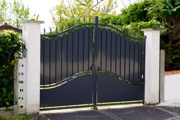 black steel gate house portal of old traditional european house
