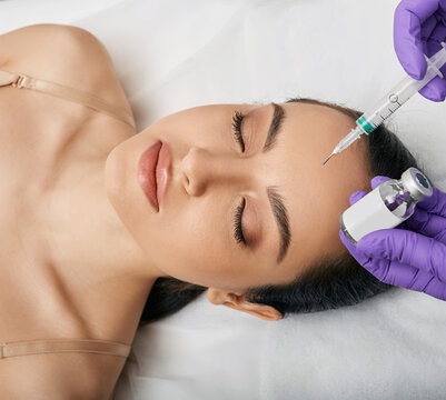 PRX-T33 peeling. PRX-T33 biorevitalization peel for woman's face at a beauty clinic. Surgery-free facial rejuvenation