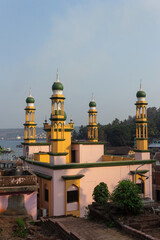 Fototapeta na wymiar Rear view of Juma Masjid Akbar Mohalla, Jaigad, Konkan, Maharashtra, India.