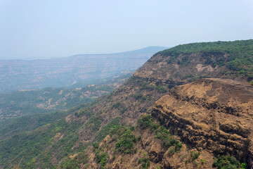 Fototapeta na wymiar Sahyadri hill ranges seen from Vishalgad fort, Vishalgad, Kolhapur, Maharashtra.