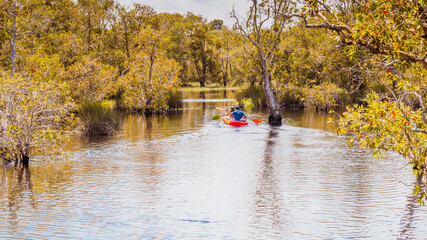 Fototapeta na wymiar Kayaks couple on the river. Back view