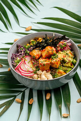 Organic vegetarian tofu poke bowl with rice and vegetables