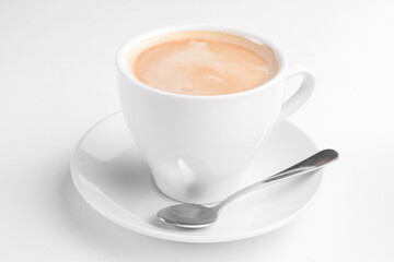 Cup of coffee with milk on a white background. Coffee time, Americano coffee in white cup