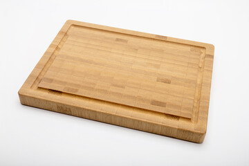 Bamboo cutting board on white background , Empty wooden plate