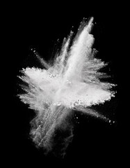 Abstract design of white powder cloud against dark background
