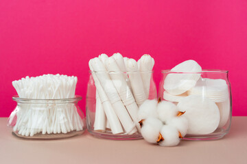 Cotton tampons and ear buds on paper background