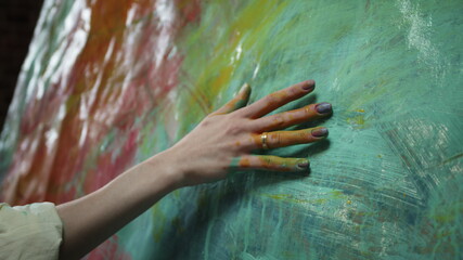 Artist's Hand. Girl Paints Picture With Her Hand.