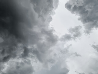 Before the storm, there was heavy rain. In the sky there are clouds covering. Lightning and strong winds The dark clouds looked like huge black smoke.