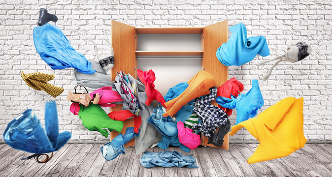 Clothes fly off the open closet. 3d illustration.