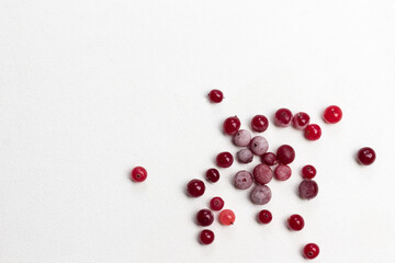 Frozen cranberries. White background.