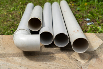 Image of some plastic pipes in an area