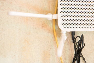 Install white modem wifi router on wall background with copy space. wireless router fast broadband...