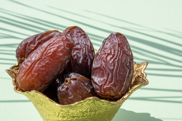Religious Muslim festival and holy month of Ramadan, EID KAREEM, concept: Close up on golden...