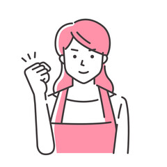 Fototapeta premium ガッツポーズのエプロン姿の若い女性