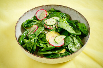 fresh salad with spinach and radish