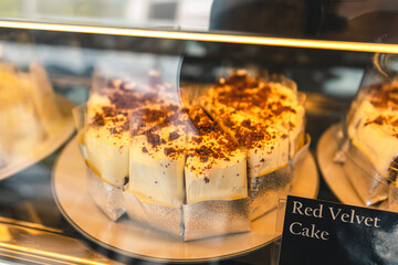 Bread and cakes in a Glass cabinet at the coffee shop