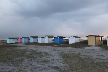 Naklejka premium tiny wooden houses at the southern sweedish coast