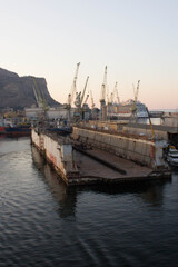 Palermo shipyard in Italy, ships in storage and cranes in the shipyard