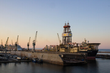 Fototapeta premium Palermo shipyard in Italy, ships in storage and cranes in the shipyard