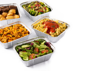 Take away healthy food in foil boxes isolated on white background. Copy space	