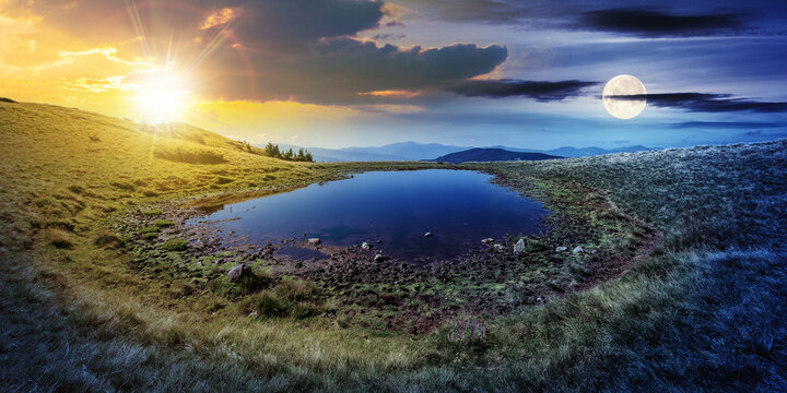 day and night time change concept above pond on the mountain meadow. wonderful summer landscape with sun and moon. grass and trees on the hills. ridge in the distance. beautiful wide panorama